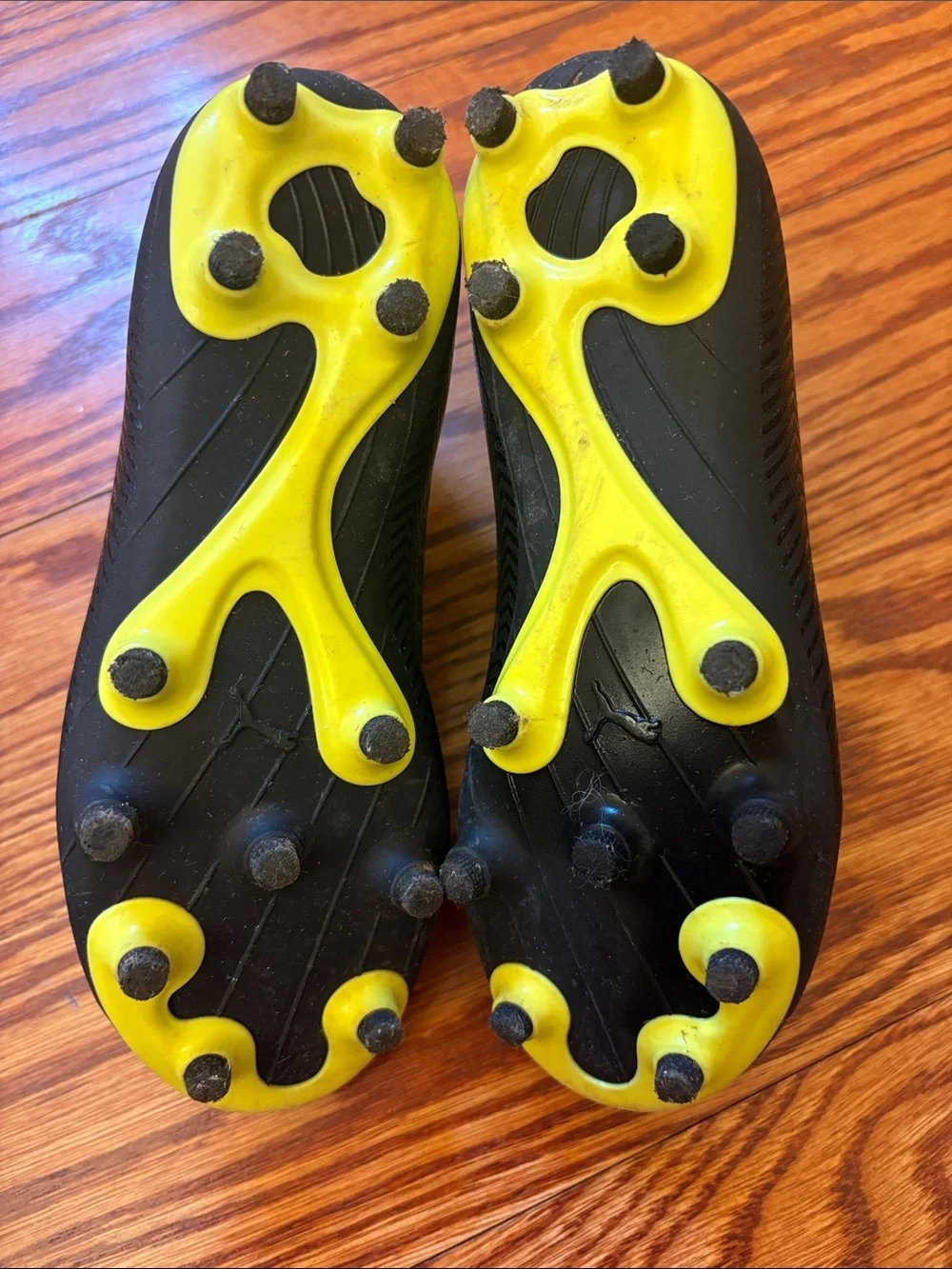 Puma Kids Black Slip On Soccer Cleats with Yellow Trim - US13C